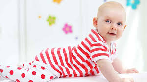 Supplier of clothing materials and fashion designer specializing in baby clothing