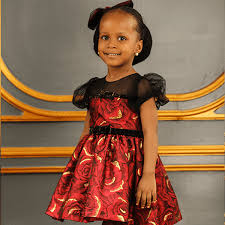 Supplier of clothing materials and fashion designer specializing in baby clothing